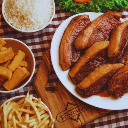 Picanha na chapa com fritas.